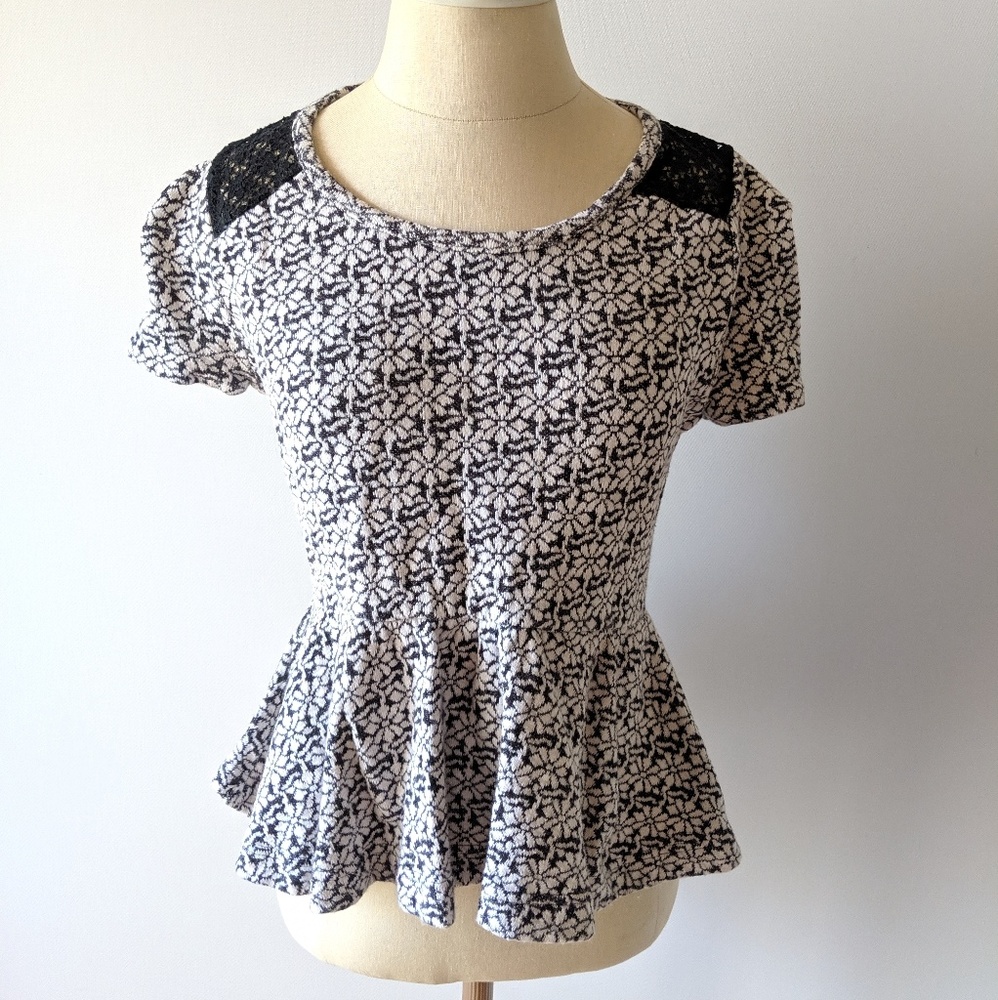 Anthropologie Knitted and Knotted Peplum blouse